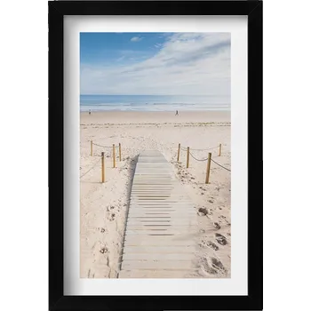 Obraz Ozdobný nástěnný obraz v černém rámu Dřevěná stezka na písku 20x30 cm