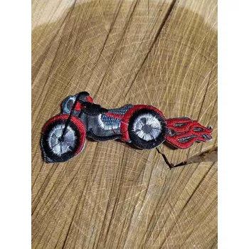 Textilní nažehlovací páska Nažehlovačka motorka s plameny barva červená