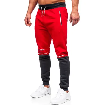 Pánské kalhoty Červené pánské tepláky s potiskem Bolf AM85 - M