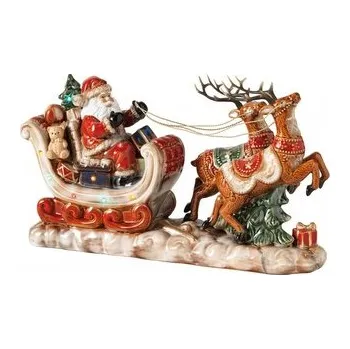 Vánoční dekorace Porcelánová soška Santa Claus v saních se sobím spřežením 44,5 cm VÁNOCE BRANDANI