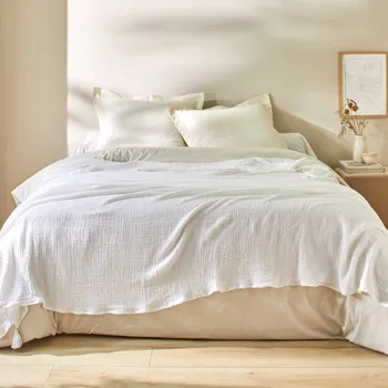 Napínací potah Blancheporte Jednobarevný přehoz na pohovku nebo jednobarevný pléd z trojitého mušelínu bílá 220x240 cm