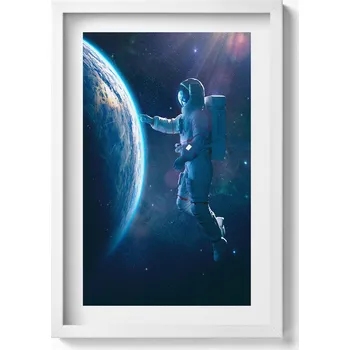 Obraz Obraz s bílým rámem a grafikou na zeď Kosmonaut a planeta Země 40x60 cm