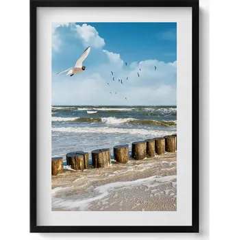 Obraz Dekorativní nástěnný obraz s černým rámem a grafikou loft Pták nad mořem 50x70 cm