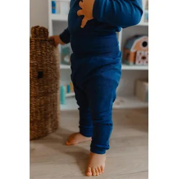 Rostoucí kalhoty z merino vlny a hedvábí Cosilana s přehrnutím modré Velikost: 86/92