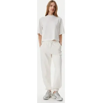 Dámské kalhoty Tommy Jeans Teplákové kalhoty Script DW0DW20670 Écru Relaxed Fit XS