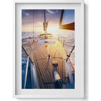 Obraz Obraz v bílém rámu na zeď Západ slunce na palubě plachetnice 50x70 cm