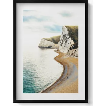 Obraz Obraz s rámem a grafikou na zeď Klidná pláž u úpatí útesů 50x70 cm