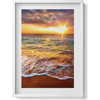 Obraz Dekorativní nástěnný obraz v bílém rámu Vlny moře při západu slunce 50x70 cm