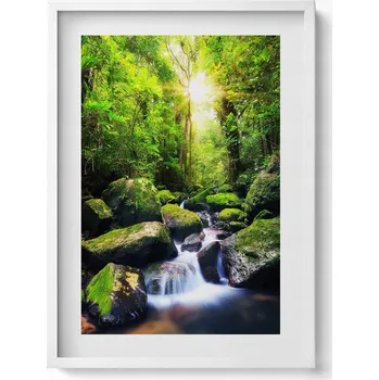 Obraz Obraz v bílém rámu dekorace na zeď Vodopád uprostřed džungle 50x70 cm