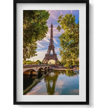 Obraz Ozdobný nástěnný obraz v černém rámu Eiffelova věž mezi stromy 50x70 cm