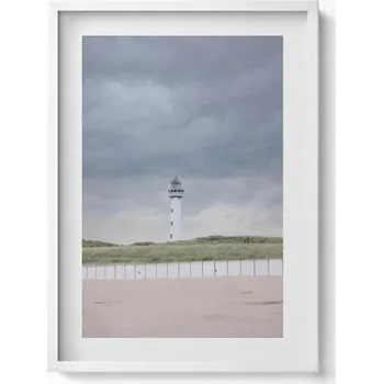 Obraz Dekorativní obraz v rámu do obýváku Osamělá maják na pláži 50x70 cm