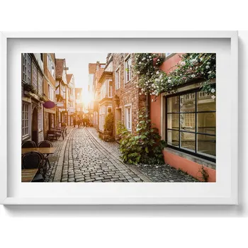 Obraz Obraz s bílým rámem a grafikou na zeď Italská ulice mezi budovami 70x50 cm