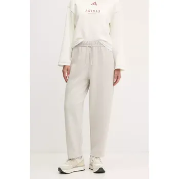 Tepláky adidas Essentials béžová barva, hladké, JD9981 01X, vel. XS