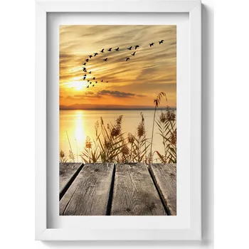 Obraz Elegantní obraz do obýváku v bílém rámu Molo se západem slunce 20x30 cm