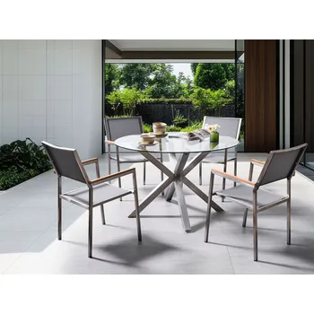 Venkovní jídelní set kulatý stůl skleněná deska stříbrný rám z nerezové oceli 4 židle moderní styl zahrada exteriér Beliani