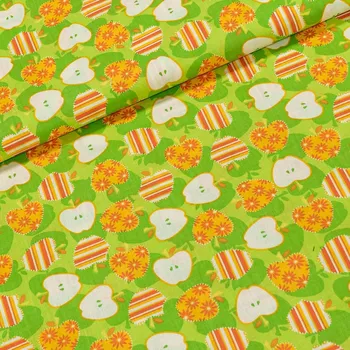 Bavlněné plátno oranžová jablíčka na zelené, š.140cm (látka v metráži)
