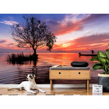 Tapeta Tapeta rybář na lodi při východu slunce