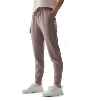 Dámské legíny Dámské tepláky 4F-TROUSERS-AW23TTROF507-83S-BEIGE Béžová XS