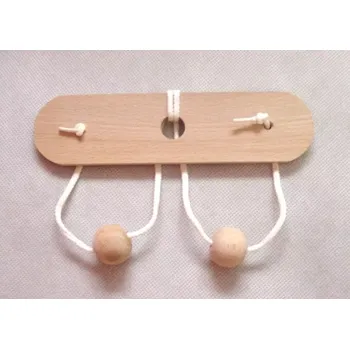 Hlavolam Dřevěný hlavolam prsa