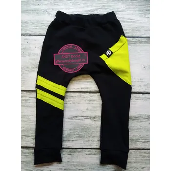 ANDY Boom Dětské tepláky baggy black s neo zelenou Velikost děti: 104
