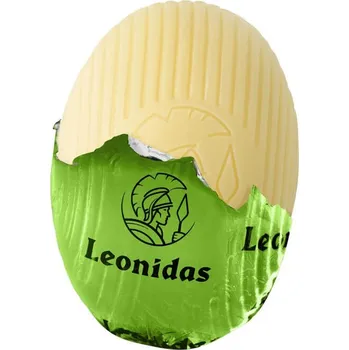 Cukrovinka Leonidas Vajíčko s pistáciovou náplní (bílá belgická čokoláda, pralinka ve tvaru vajíčka, cca 10g)