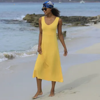Dámské šaty Jednobarevné rozšířené midi šaty bez rukávů žlutá 52