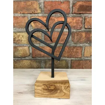 Obraz Kované dvojité srdce na dřevěném podstavci