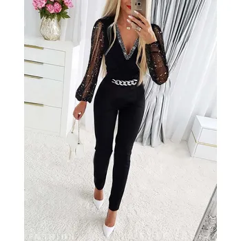 Dámské kalhoty Elegantní overal s hlubokým výstřihem do "V" se stříbrným lemováním (SKLAD) Velikost: XL