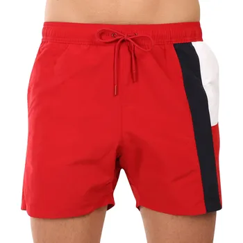 Pánské plavky Pánské plavky Tommy Hilfiger červené (UM0UM03483 XLD) L UM0UM03483 XLD Možnost vrácení zboží ZDARMA do 120 dnů!
