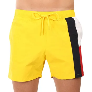 Pánské plavky Pánské plavky Tommy Hilfiger žluté (UM0UM03483 ZGY) M UM0UM03483 ZGY Možnost vrácení zboží ZDARMA do 120 dnů!