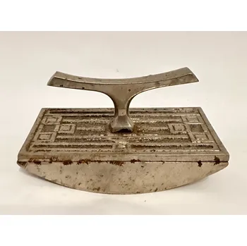 Kovová pomůcka proti otisku razítka