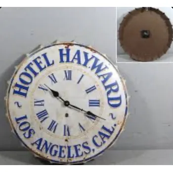 Hodiny Nástěnné kovové hodiny Hotel Los Angeles - pivní zátka