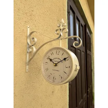 Obraz Bílé prostorové hodiny s teploměrem