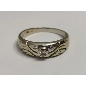 Prsten Zlatý dámský prsten z bílého zlata se zirkony