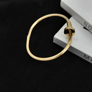 Náramek Elegantní ocelový náramek s moderním designem | stylový šperk - Zlato , 58-60 mm