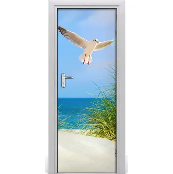 Fototapeta Fototapeta na dveře samolepící méva nad dunami 75x205 cm