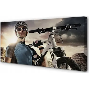 Obraz Obraz na plátně Cyklista na kole, mraky 100x50
