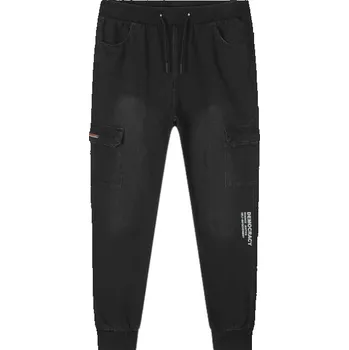 Chlapecké kalhoty CHLAPECKÉ RIFLOVÉ tepláky černé Kugo CK0936 (Chlapecké kalhoty ze slabé elastické rifloviny)