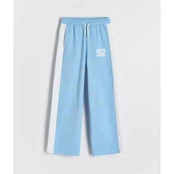 Dívčí kalhoty Reserved - Kalhoty s širokými nohavicemi a postranním pruhem - bleděmodrá - 866GO-05X - 866GO-05X-152