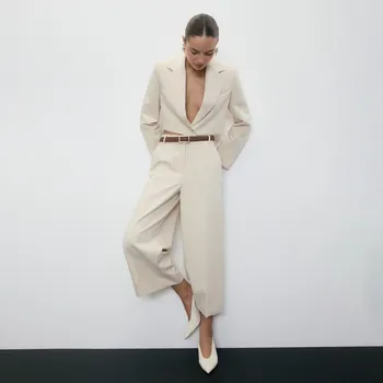 Dámské kalhoty Reserved - Kalhoty s&nbsp;širokými nohavicemi a&nbsp;páskem - krémová - YT216-01X - YT216-01X-S