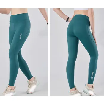 Dámské legíny Sportovní legíny be-AM RUN - zelená Velikost: M