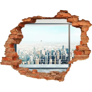 Fototapeta Foto fotografie díra na zeď Výhled na město