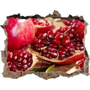 Fototapeta Nálepka 3D díra na zeď Granátové jablko s listmi