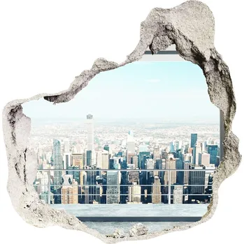 Fototapeta Foto fotografie díra na zeď Výhled na město