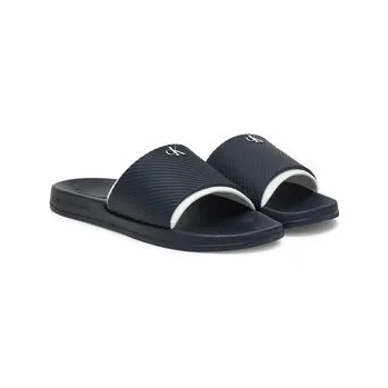 Pánská obuv Nazouváky Calvin Klein Jeans Slide Rubber Neoprene Text YM0YM01234 Tmavomodrá 44