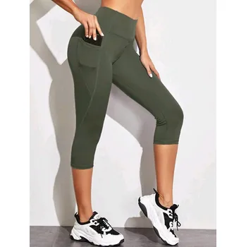 Dámské legíny Dámské 3/4 legíny s kapsami Barva: Zelená, Velikostní tabulka: S