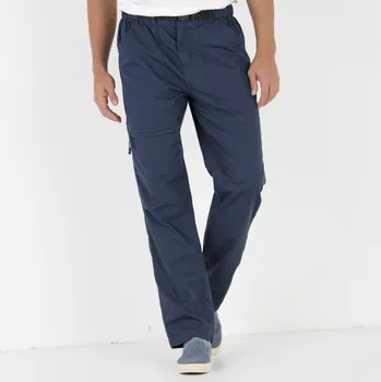 Dámské kalhoty Dlouhé kalhoty s pružným pasem a kapsami + sladěný pásek nám.modrá 40/42