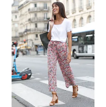 Dámské kalhoty Splývavé 7/8 kalhoty s potiskem korálová 50