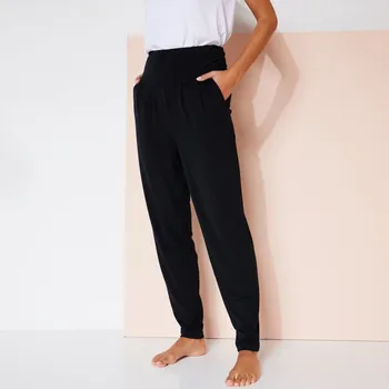 Dámské kalhoty Pohodlné úpletové kalhoty na jógu černá 52