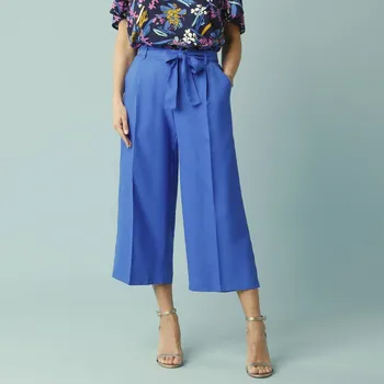 Dámské kalhoty Široké 7/8 kalhoty s pružným pasem a páskem, pro menší postavu tmavě modrá 50